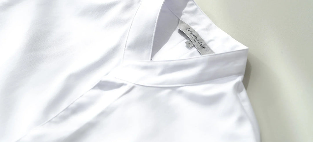 Why do chefs wear white clothing?